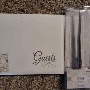 Wedding guest book and pen. White